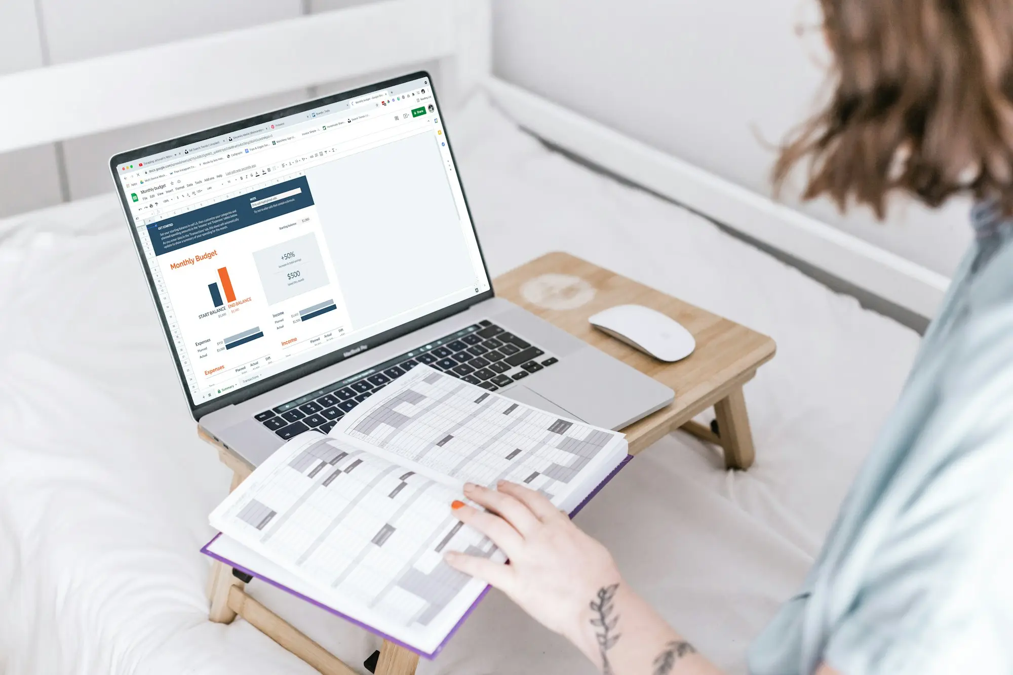 Business owner planning cash flow with a laptop and calendar